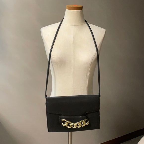 H & M black crossbody with bold gold chain front accent. - Picture 2 of 11
